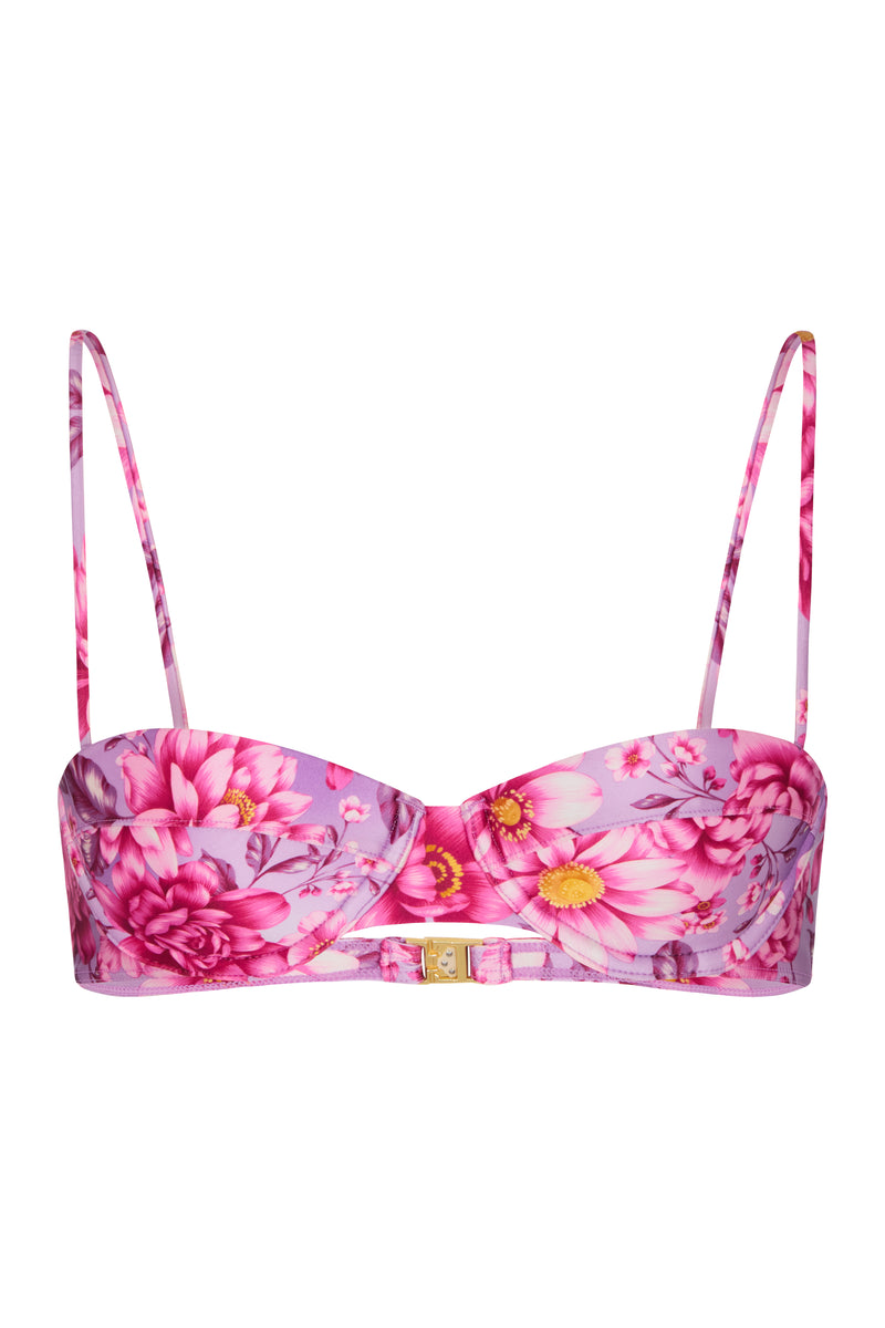 A pink balconette bikini top with a floral print, featuring adjustable straps and gold hardware.