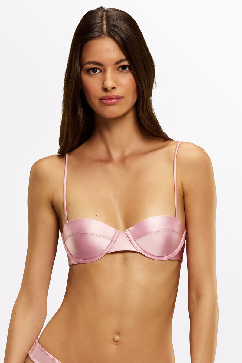 Model wearing Jaci balconette bikini top in Bon Bon – front view