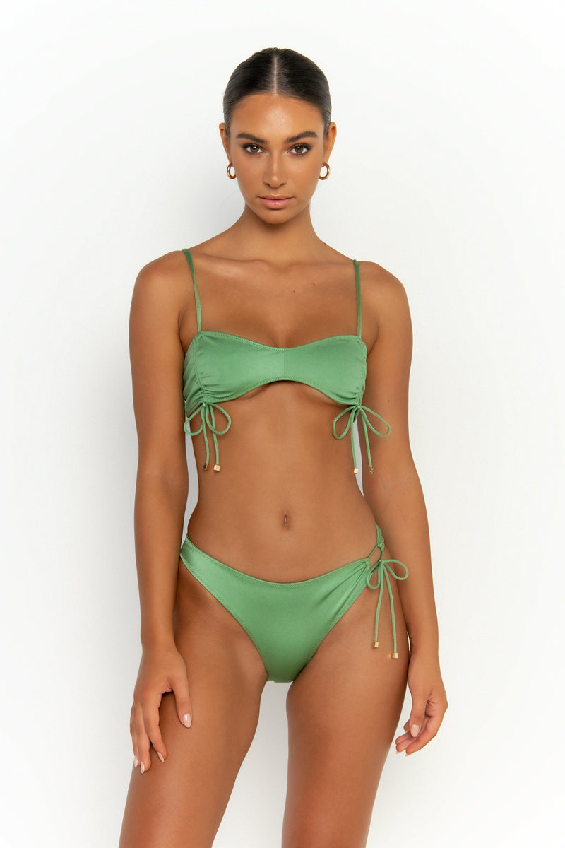 front view elegant woman wearing luxury swimsuit from sommer swim - adriana maltese is a mint green bikini with high waisted bikini bottom