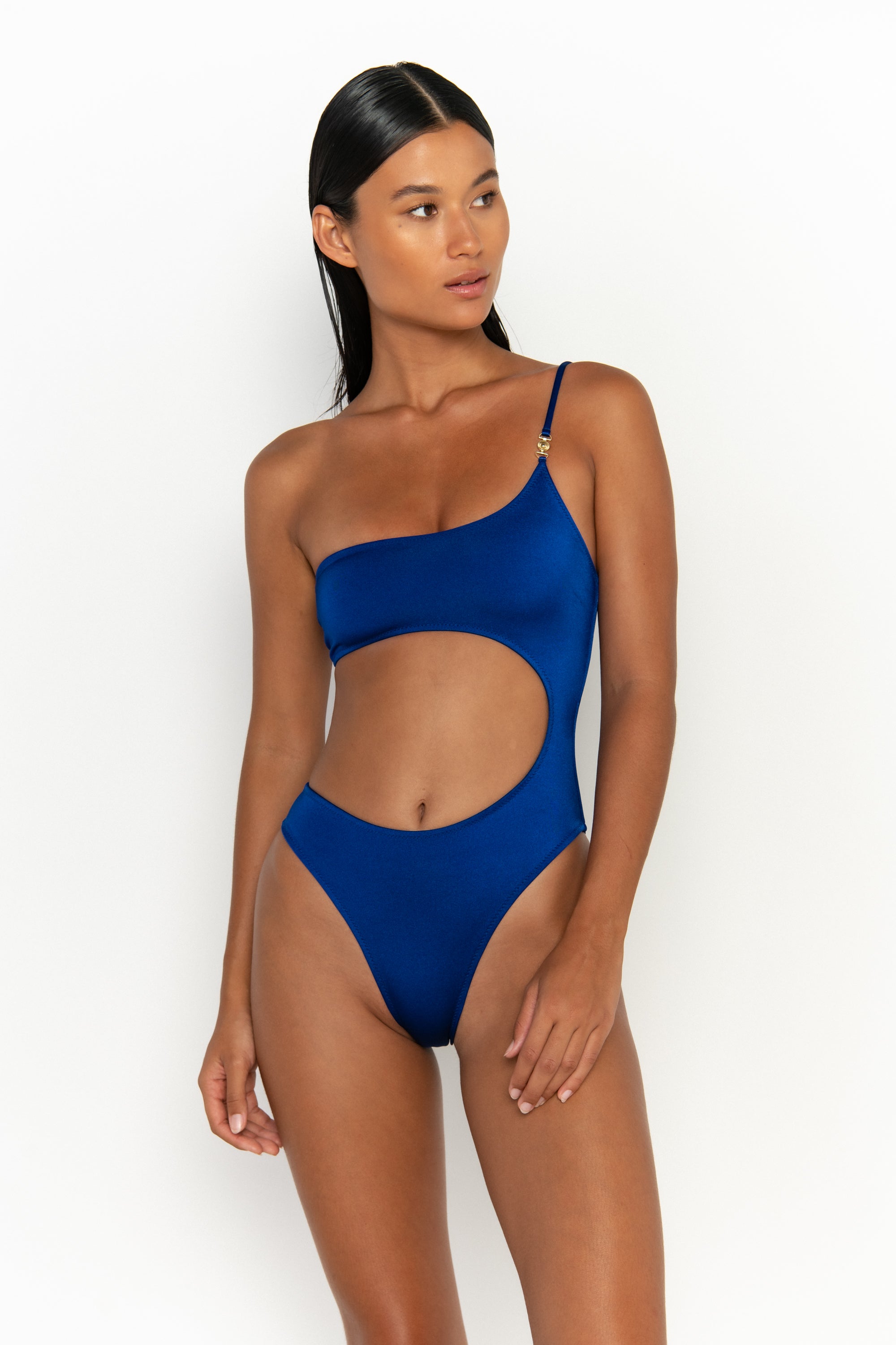 front view elegant woman wearing luxury swimsuit from sommer swim - bonita olympus is an royal blue one piece one shoulder swimsuit