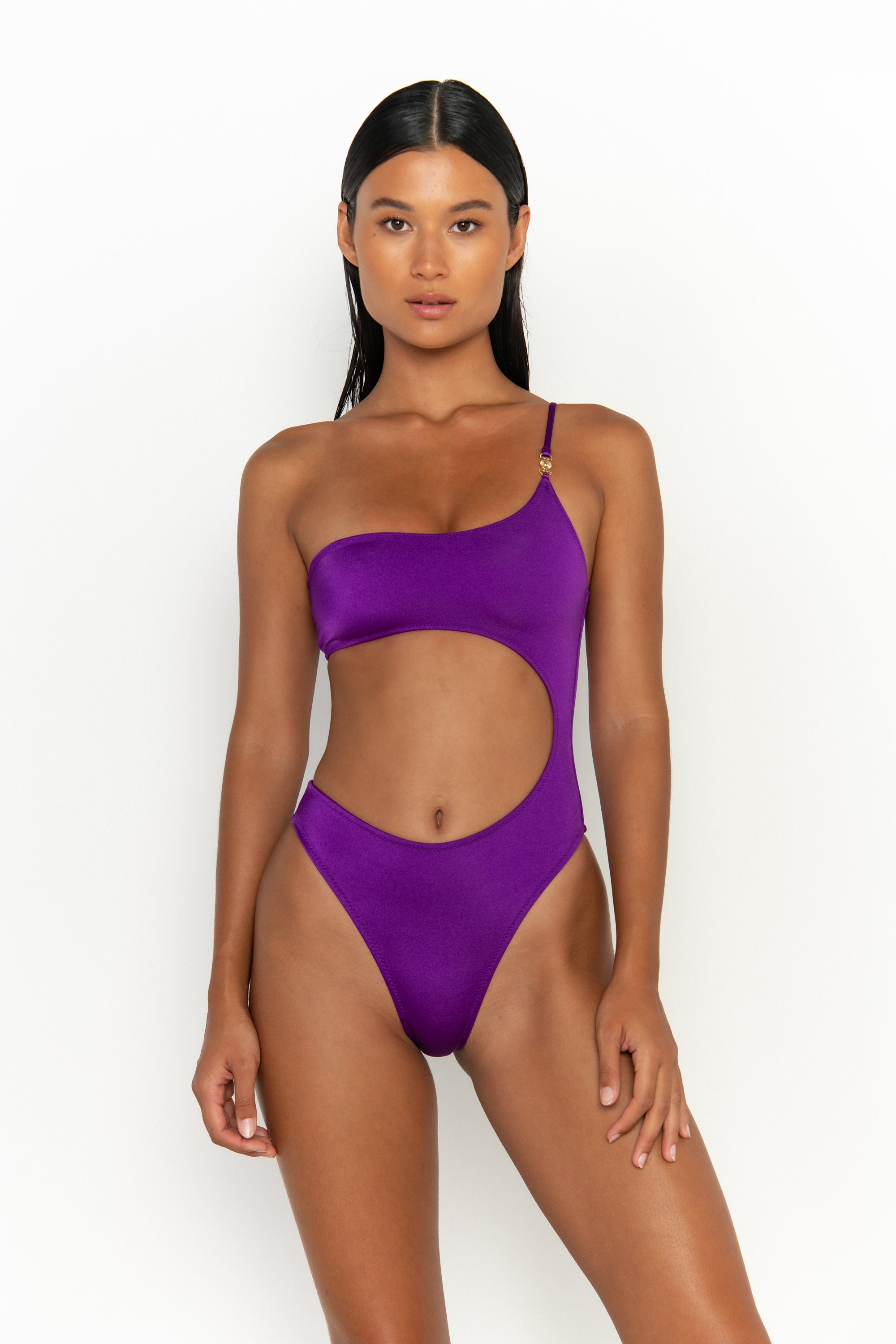 front view elegant woman wearing luxury swimsuit from sommer swim - bonita petunia is a purple one piece one shoulder swimsuit