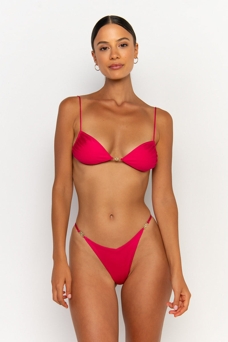 front view elegant woman wearing luxury swimsuit from sommer swim - ella magenta is a fuchsia bikini with bralette bikini top