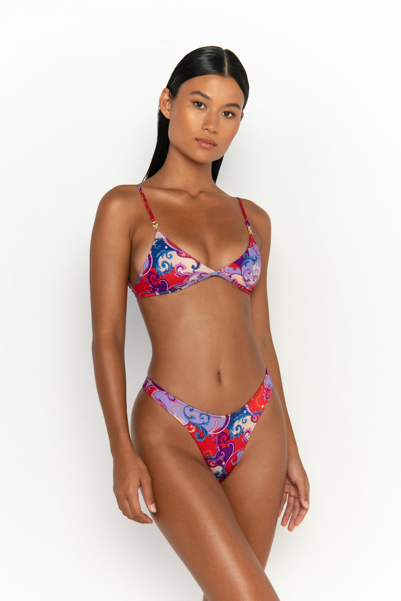 side view elegant woman wearing luxury swimsuit from sommer swim - juliet rococo is a print bikini with bralette bikini top