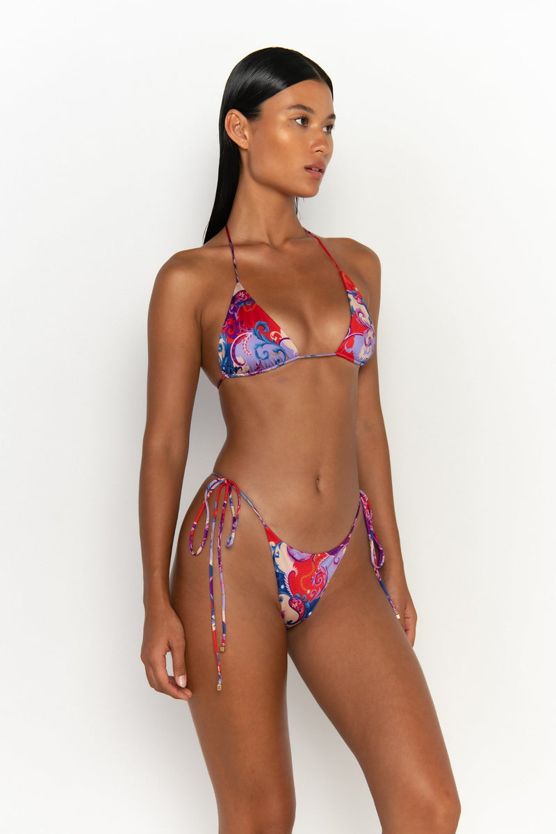 side view elegant woman wearing luxury swimsuit from sommer swim - kaia rococo is a print bikini with triangle bikini top