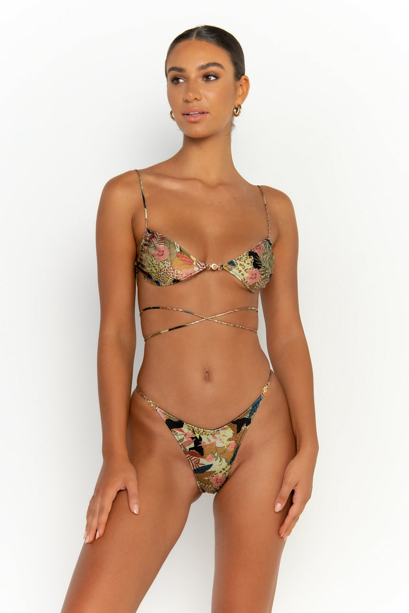 front alternative view elegant woman wearing luxury swimsuit from sommer swim - lia jaguar is a print bikini with brazilian bikini bottom