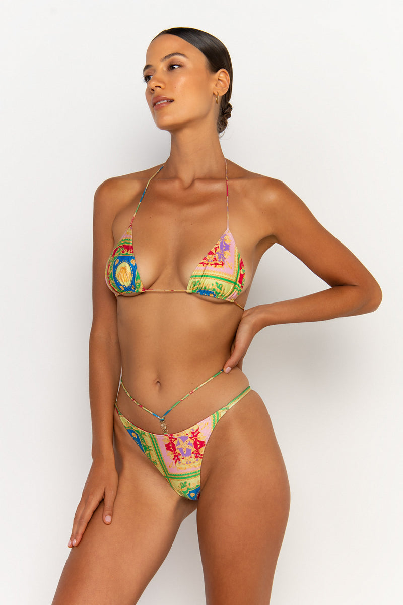 side view elegant woman wearing luxury swimsuit from sommer swim - kamilla posidonia is a print bikini with brazilian bikini bottom