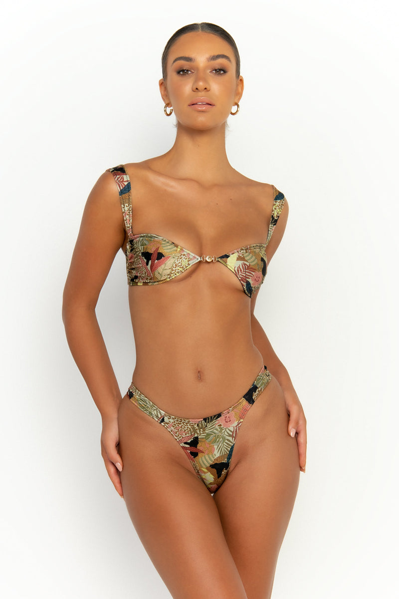 front view elegant woman wearing luxury swimsuit from sommer swim - zita jaguar is a print bikini with cheeky bikini bottom