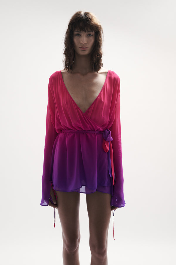 front straight side view elegant woman wearing luxury swimwear from sommer swim - palma berry crush is a wrap dress in pink and purple gradient color