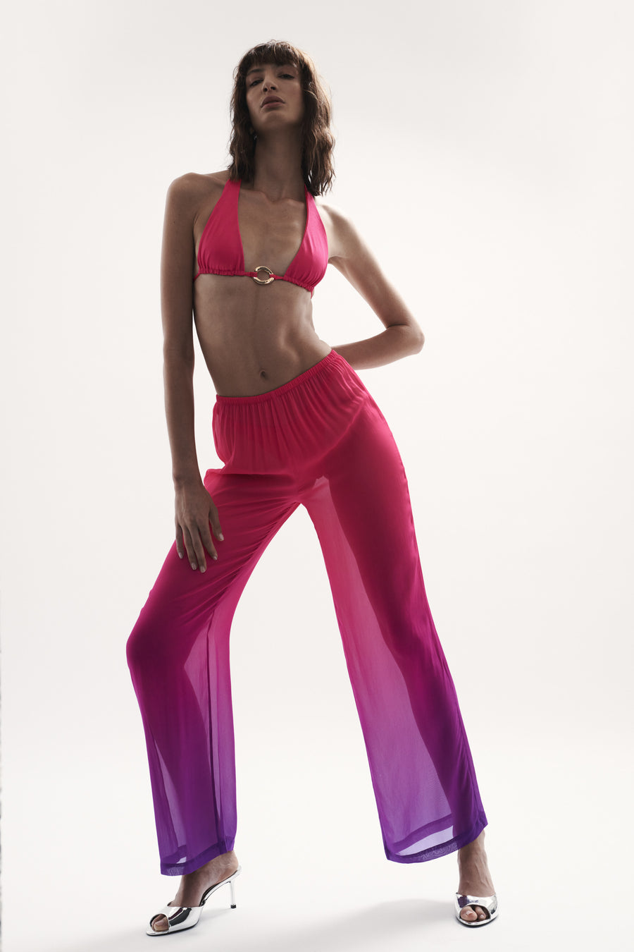front view elegant woman wearing luxury resort wear from sommer swim - capri berry crush is stylish pant