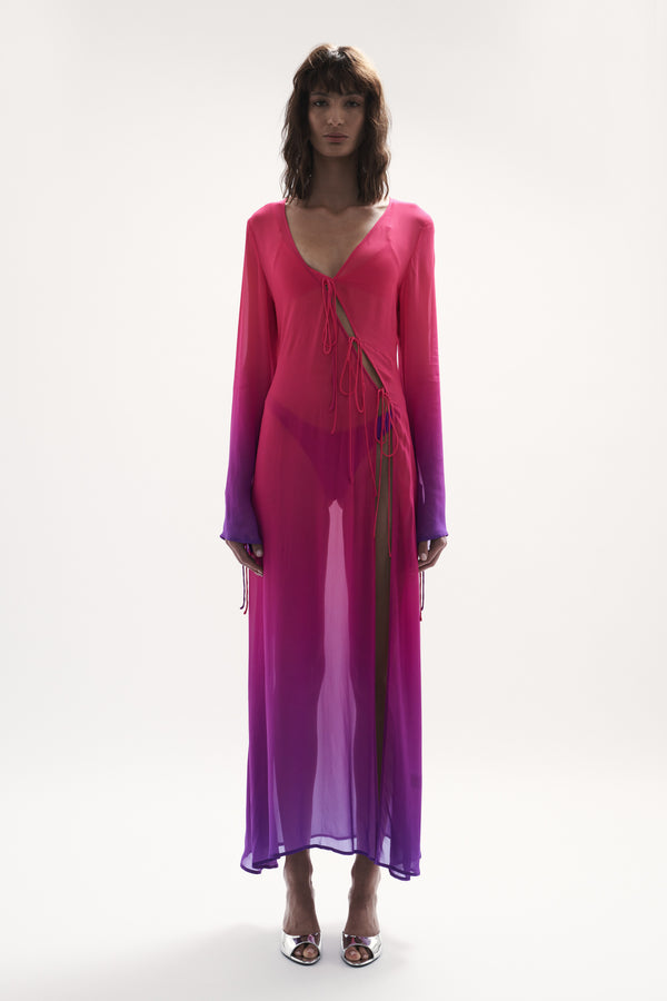 front straight view elegant woman wearing luxury swimwear from sommer swim - pelicano berry crush is a pink and purple gradient robe dress
