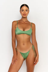 front view elegant woman wearing luxury swimsuit from sommer swim - pilar maltese is a mint green bikini with bralette bikini top