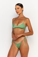 side view elegant woman wearing luxury swimsuit from sommer swim - pilar maltese is a mint green bikini with bralette bikini top